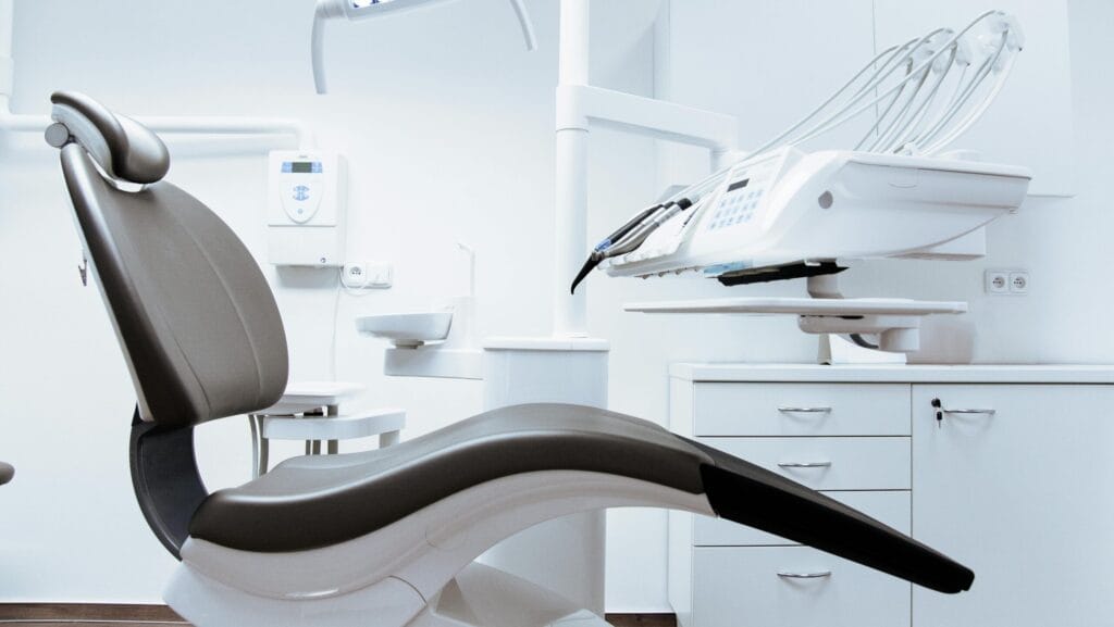 Modern dental clinic setup with ergonomic chair, LED light, and advanced dental instruments