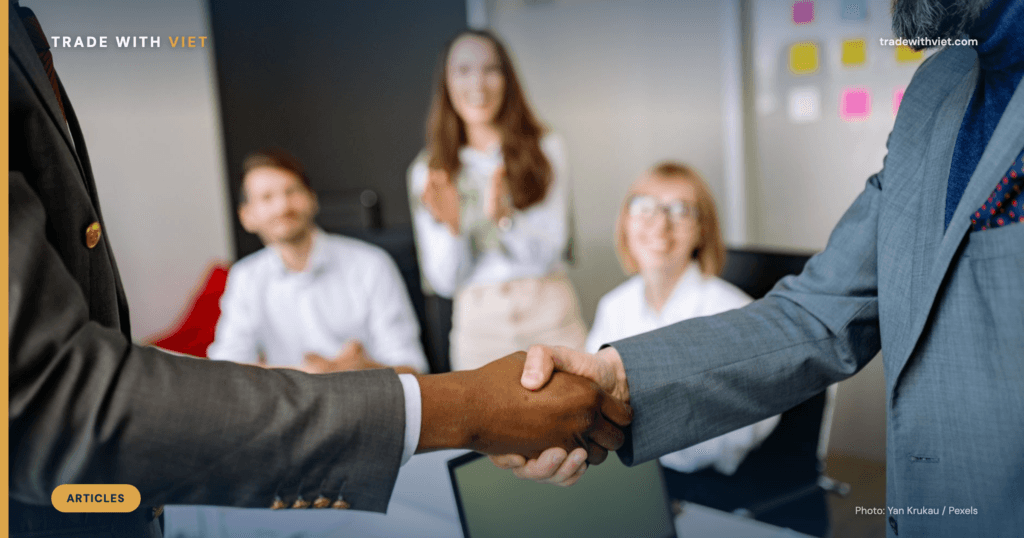 Business negotiation meeting and handshake