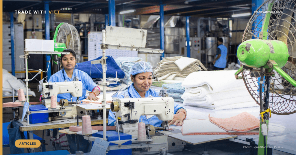 Workers on a Vietnam garment factory sewing line
